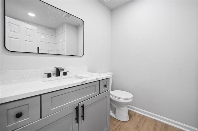 3156 Ozmer Lndg, Decatur, GA 30034 - bathroom with wood finished floors, vanity, toilet, and baseboards