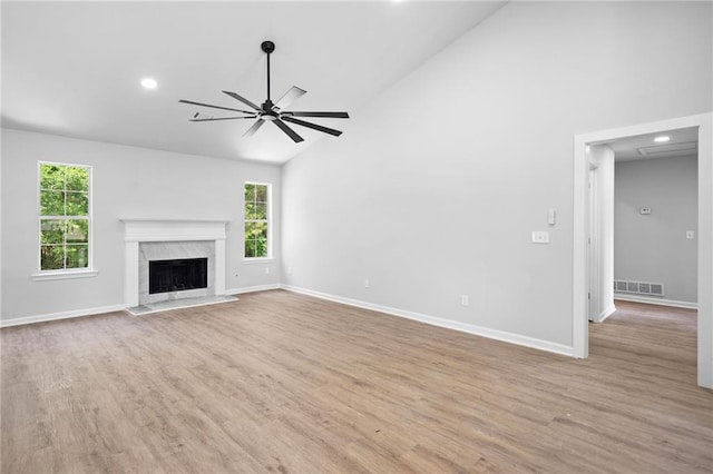3156 Ozmer Lndg, Decatur, GA 30034 - unfurnished living room with high vaulted ceiling, ceiling fan, baseboards, wood finished floors, and a premium fireplace