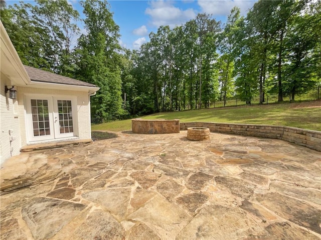 156 Page Pl, Canton, GA 30114 - view of patio / terrace featuring french doors and a fire pit