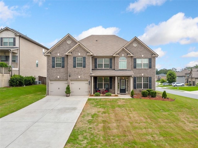 craftsman-style home featuring a garage, a porch, and a front lawn