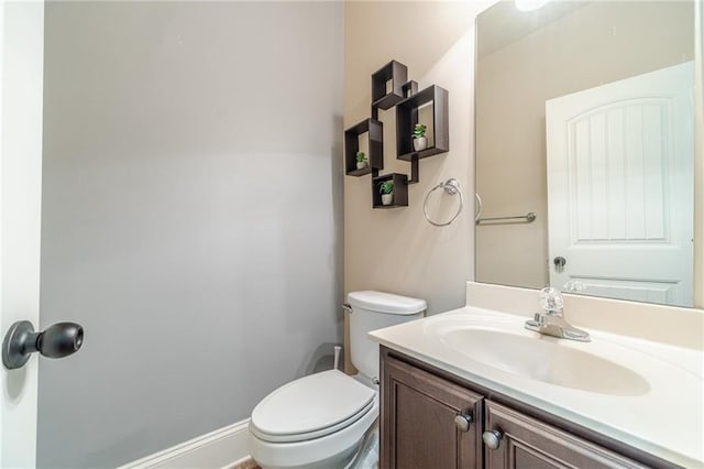 882 Nestling Dr, Lawrenceville, GA 30045 - bathroom featuring vanity and toilet