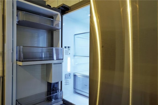 room details with stainless steel fridge