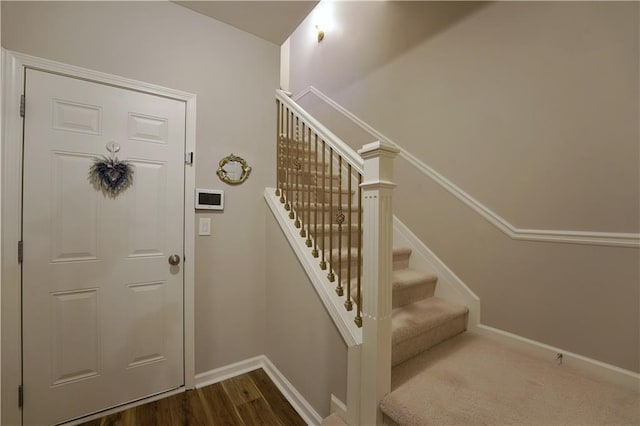 foyer featuring wood-type flooring