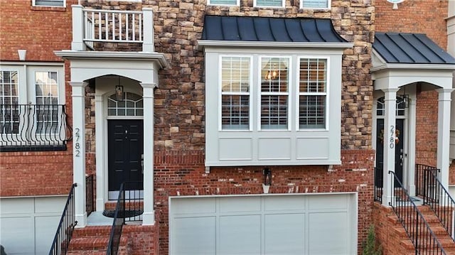 property entrance featuring a garage