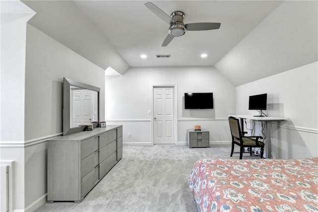 bedroom featuring baseboards, vaulted ceiling, light carpet, and visible vents