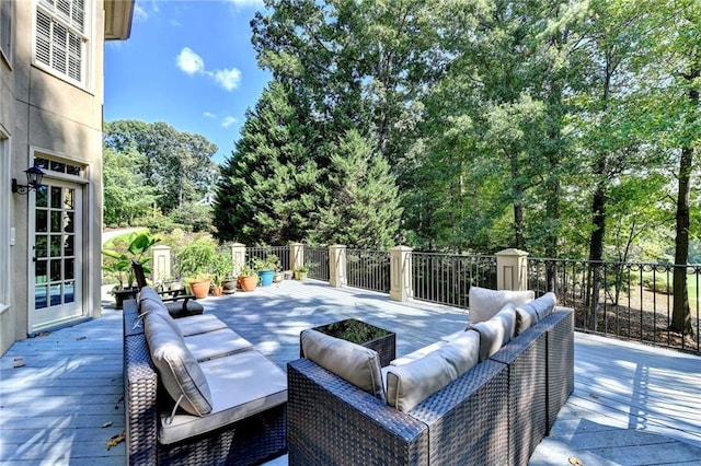view of patio featuring a deck and an outdoor hangout area