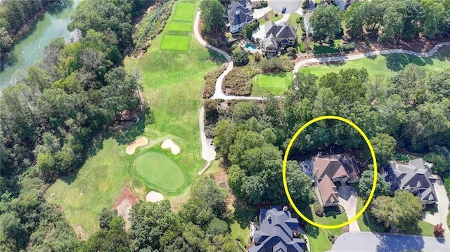 aerial view with a water view, a residential view, and golf course view