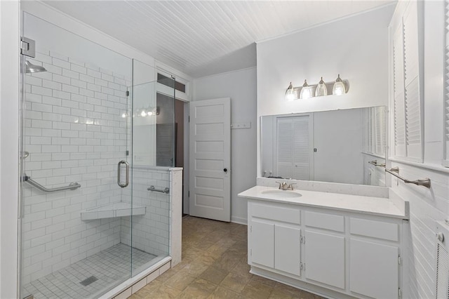 bathroom with vanity and an enclosed shower