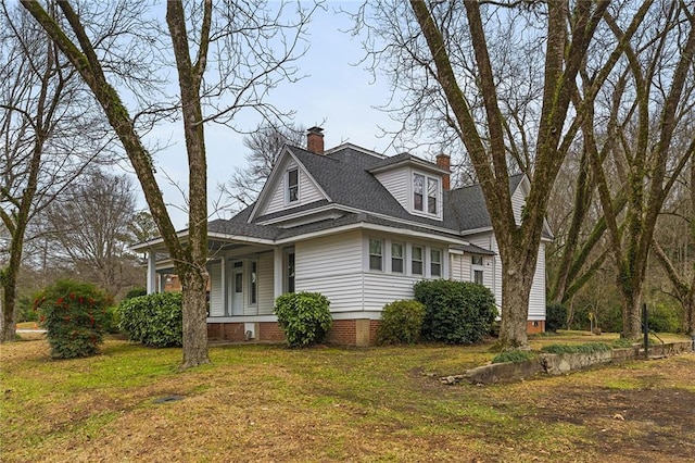 view of front of home with a front yard