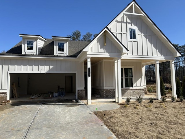 modern inspired farmhouse with covered porch