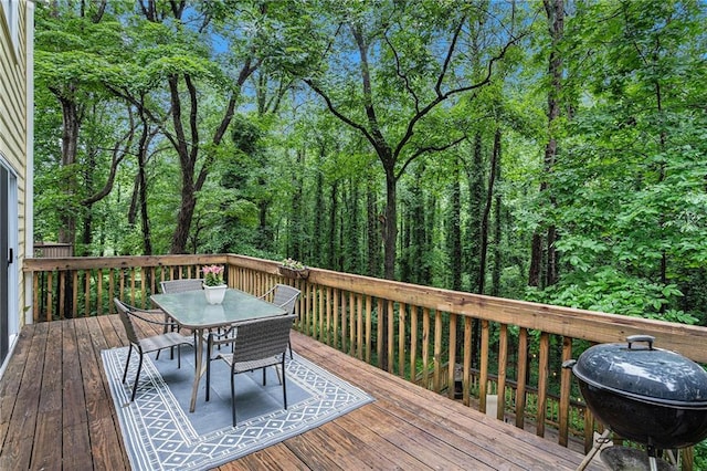 1879 Beaver Dam Ln NE, Marietta, GA 30062 - wooden terrace with outdoor dining area and area for grilling