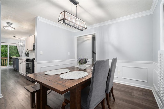 1879 Beaver Dam Ln NE, Marietta, GA 30062 - dining area with a chandelier, dark wood-type flooring, a decorative wall, a wainscoted wall, and ornamental molding