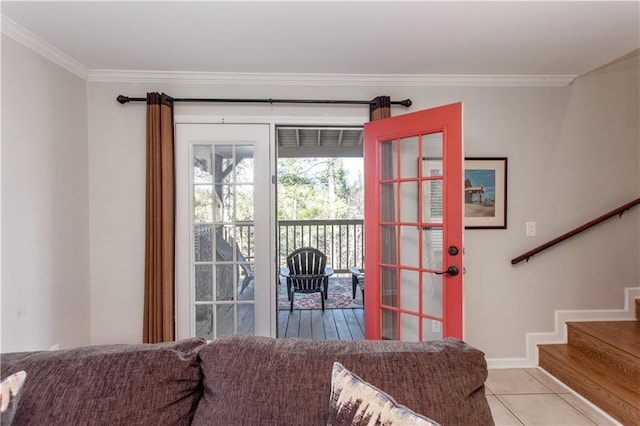 interior space with light tile patterned floors and crown molding