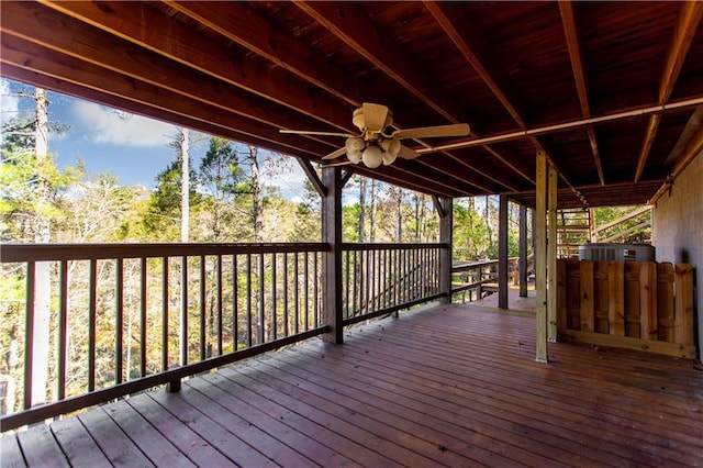 wooden deck featuring ceiling fan