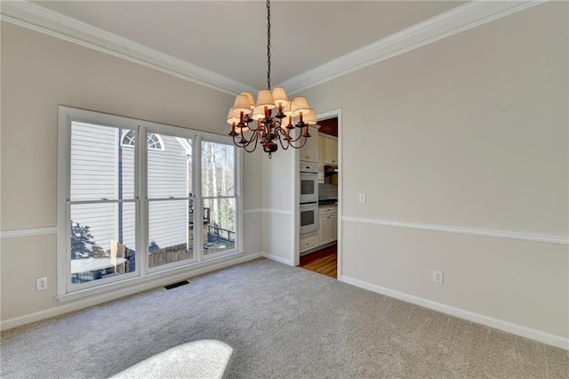 1924 Wilkenson Xing, Marietta, GA 30066 - unfurnished dining area featuring a chandelier, dark carpet, crown molding, and baseboards
