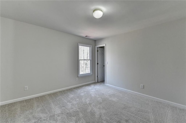 1924 Wilkenson Xing, Marietta, GA 30066 - carpeted spare room featuring baseboards