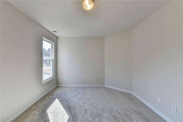 1924 Wilkenson Xing, Marietta, GA 30066 - unfurnished room with healthy amount of natural light, light carpet, and baseboards