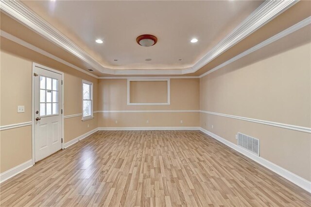 1924 Wilkenson Xing, Marietta, GA 30066 - unfurnished room with a tray ceiling, light wood-style flooring, crown molding, baseboards, and recessed lighting