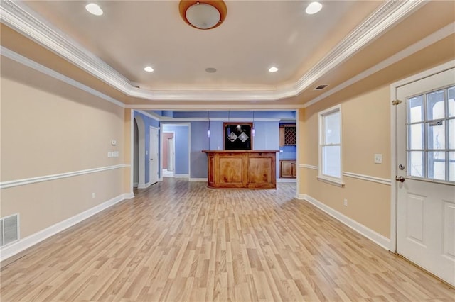 1924 Wilkenson Xing, Marietta, GA 30066 - unfurnished living room with a raised ceiling, ornamental molding, light wood-style floors, baseboards, and recessed lighting