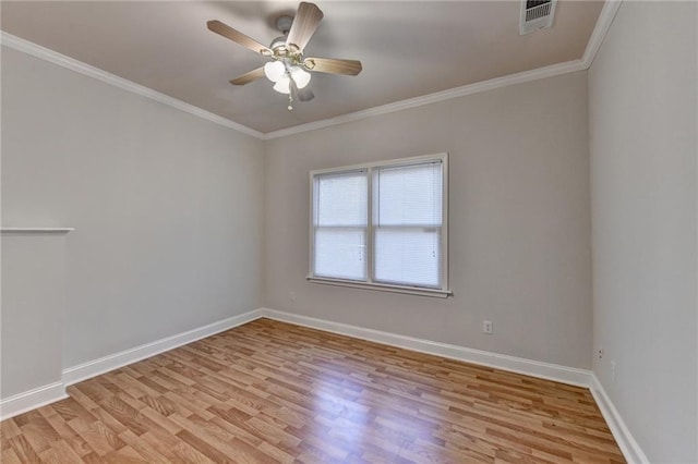 1924 Wilkenson Xing, Marietta, GA 30066 - spare room with light wood-style flooring, baseboards, crown molding, and a ceiling fan