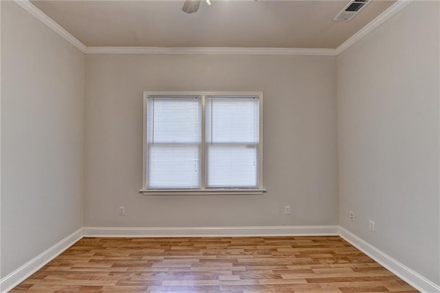1924 Wilkenson Xing, Marietta, GA 30066 - empty room featuring light wood finished floors, crown molding, and baseboards