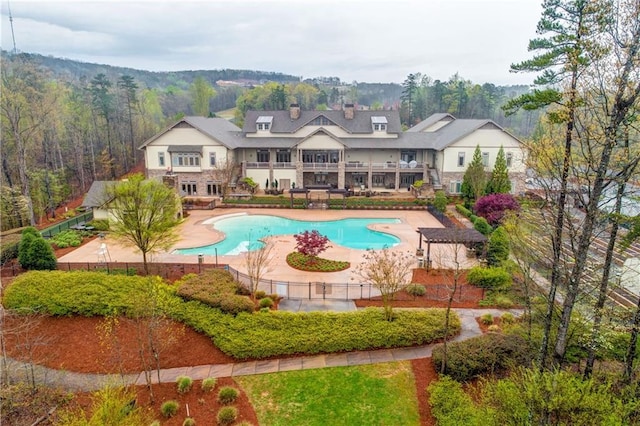 view of pool featuring fence, a patio area, and a fenced in pool