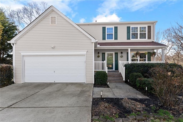 view of property featuring a garage and a porch