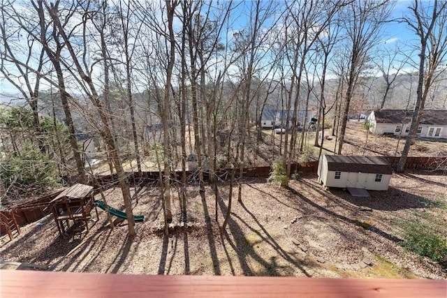 wooden terrace with a storage unit