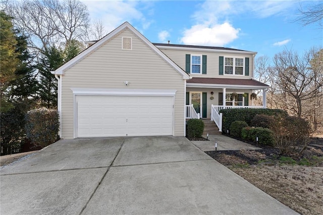 front of property with a garage and covered porch