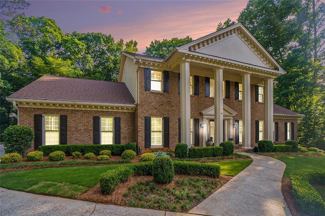 2080 Old Dominion Rd, Atlanta, GA 30350 - greek revival inspired property with brick siding and a front yard