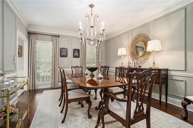 2080 Old Dominion Rd, Atlanta, GA 30350 - dining room featuring a decorative wall, a chandelier, hardwood / wood-style floors, and ornamental molding