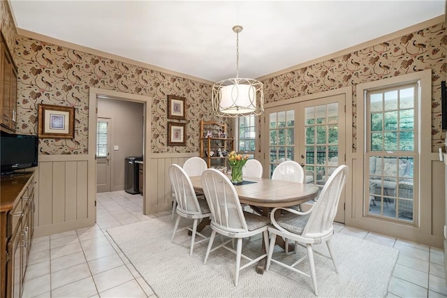 2080 Old Dominion Rd, Atlanta, GA 30350 - dining room featuring a wainscoted wall, wallpapered walls, light tile patterned floors, and french doors