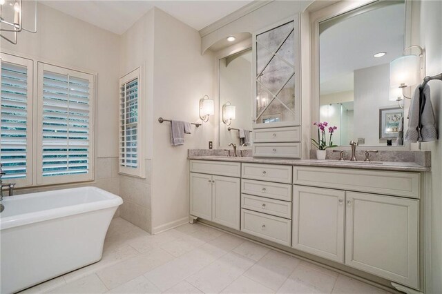 2080 Old Dominion Rd, Atlanta, GA 30350 - full bathroom with double vanity and a soaking tub
