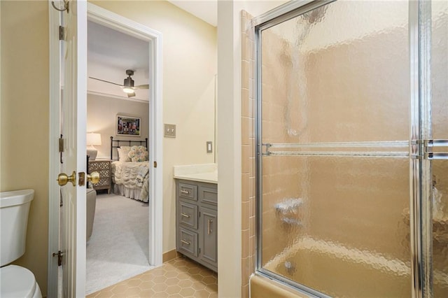 2080 Old Dominion Rd, Atlanta, GA 30350 - ensuite bathroom featuring toilet, tile patterned floors, vanity, and shower / bath combination with glass door