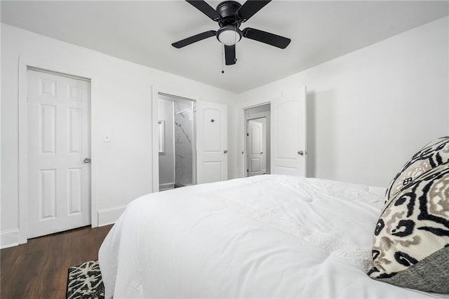 1712 Evans Dr SW, Atlanta, GA 30310 - bedroom featuring dark wood-style flooring, baseboards, a ceiling fan, and ensuite bathroom