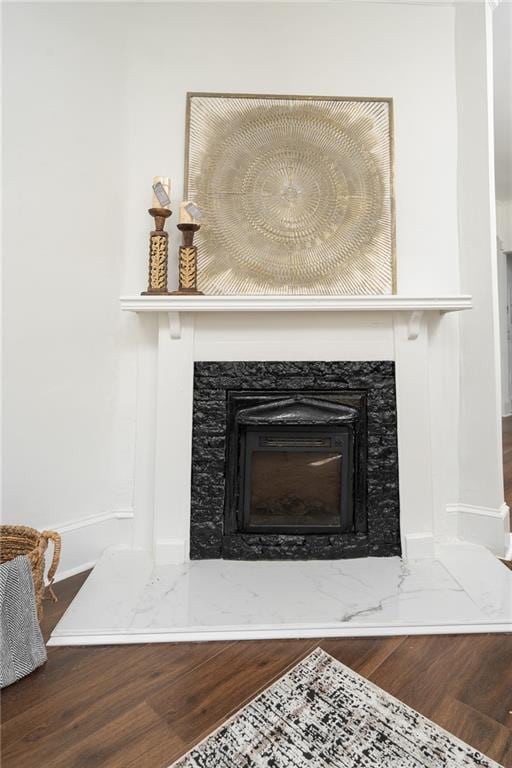 1712 Evans Dr SW, Atlanta, GA 30310 - detailed view of wood finished floors, a premium fireplace, and baseboards