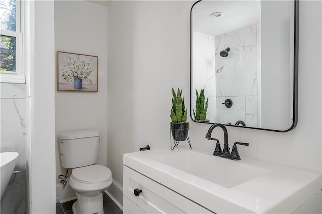1712 Evans Dr SW, Atlanta, GA 30310 - full bath with toilet, vanity, and baseboards
