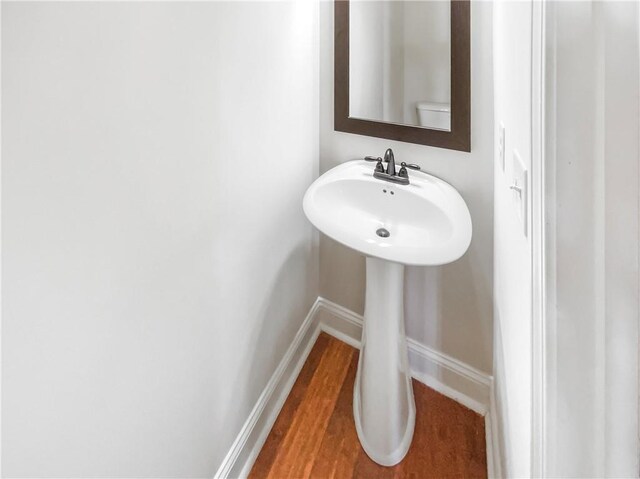 bathroom featuring hardwood / wood-style flooring