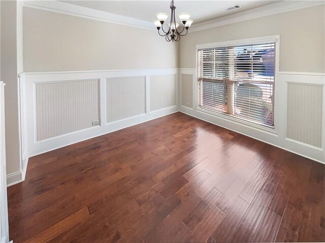 unfurnished dining area featuring a notable chandelier, dark hardwood / wood-style flooring, and crown molding