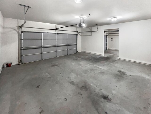 garage featuring a garage door opener