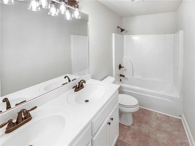 full bathroom featuring vanity, toilet, and shower / bath combination