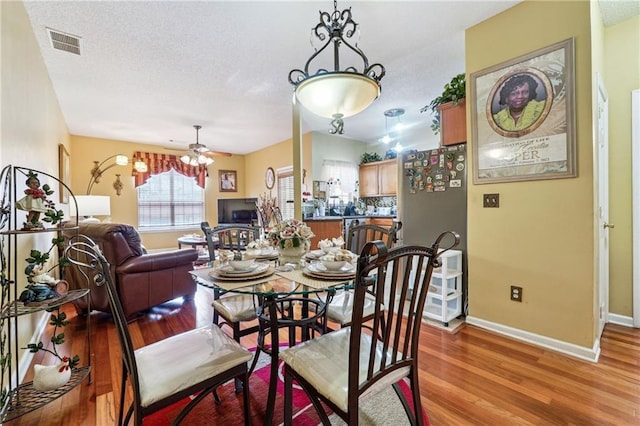 dining room with light hardwood / wood-style flooring