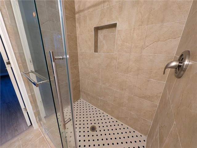 bathroom featuring an enclosed shower