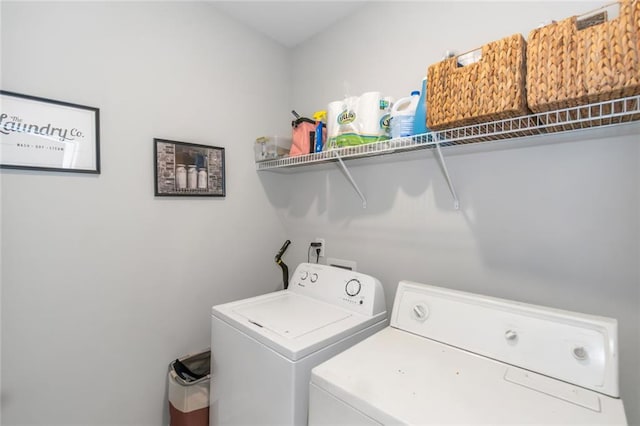 laundry area with laundry area and washer and dryer