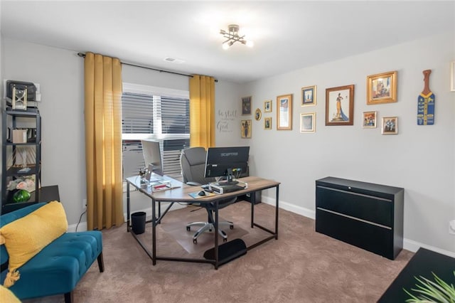 office space with carpet floors, visible vents, and baseboards