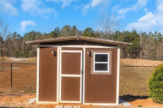 view of outbuilding featuring an outbuilding and a fenced backyard