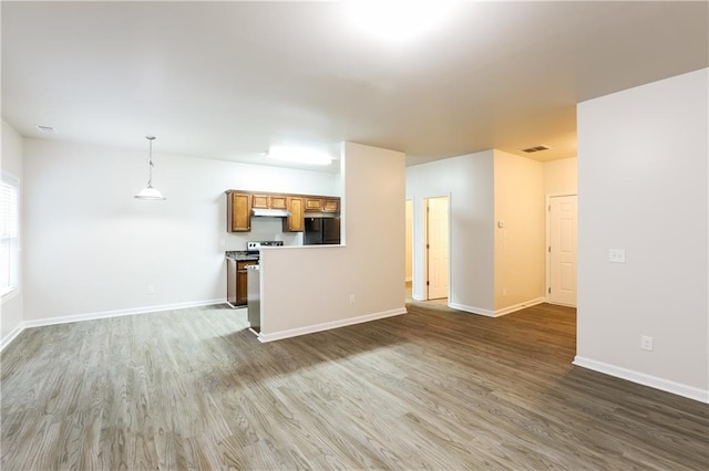 unfurnished living room featuring dark wood-type flooring