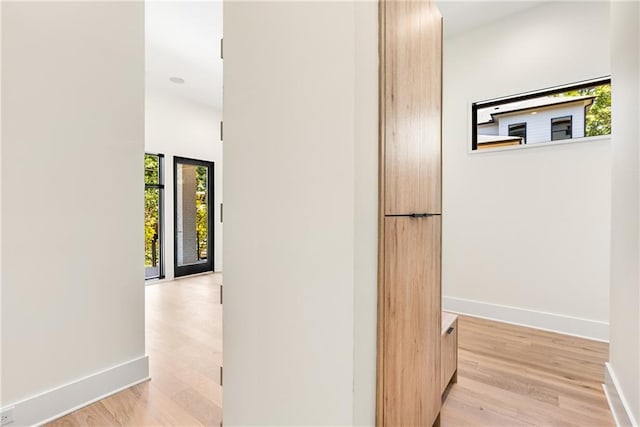 hallway featuring light wood-type flooring