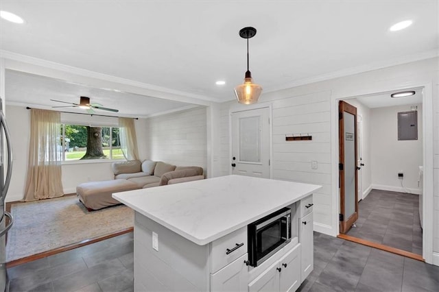 1162 Newtown Church Rd NE, Calhoun, GA 30701 - kitchen featuring appliances with stainless steel finishes, electric panel, crown molding, white cabinetry, and open floor plan