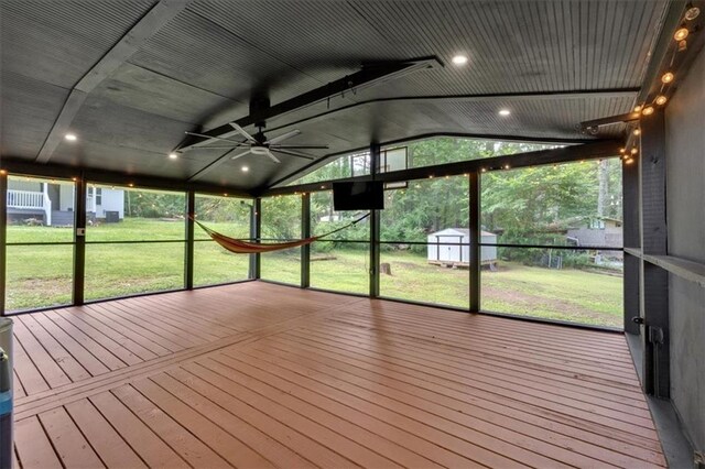 1162 Newtown Church Rd NE, Calhoun, GA 30701 - unfurnished sunroom with a ceiling fan, vaulted ceiling, and plenty of natural light